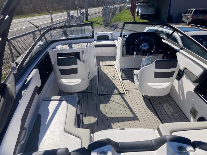 Slide: The Image of 2024 Yamaha Boats 195S interior with modern seating and steering wheel. - 5