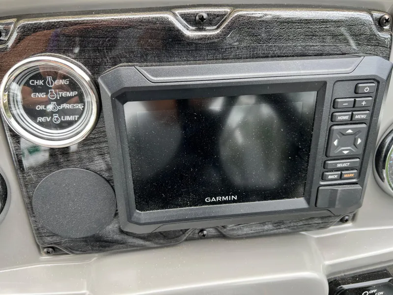 Slide: The Image of Dashboard of 2026 Tahoe Pontoon 2180 with Garmin display and engine gauges. - 12