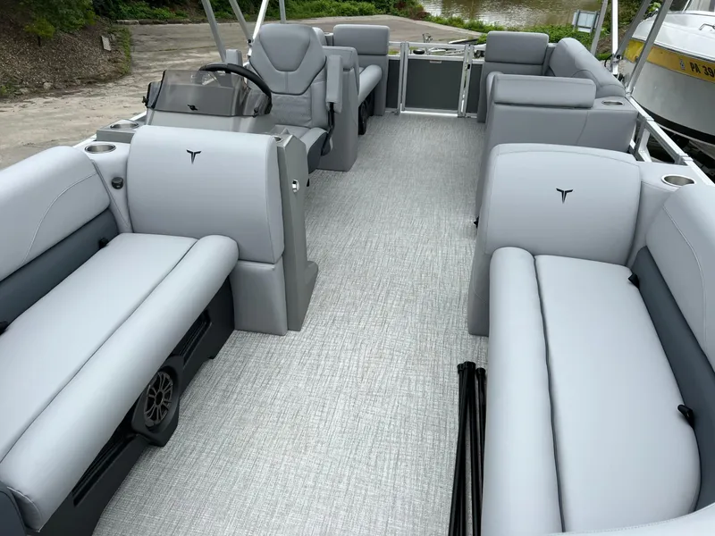 Slide: The Image of 2026 Tahoe Pontoon 2180 interior with gray seating and modern design. - 7