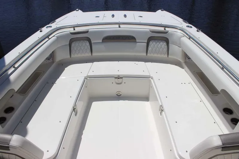 Slide: The Image of 2023 World Cat 280 CC-X boat interior with spacious seating and storage compartments. - 10