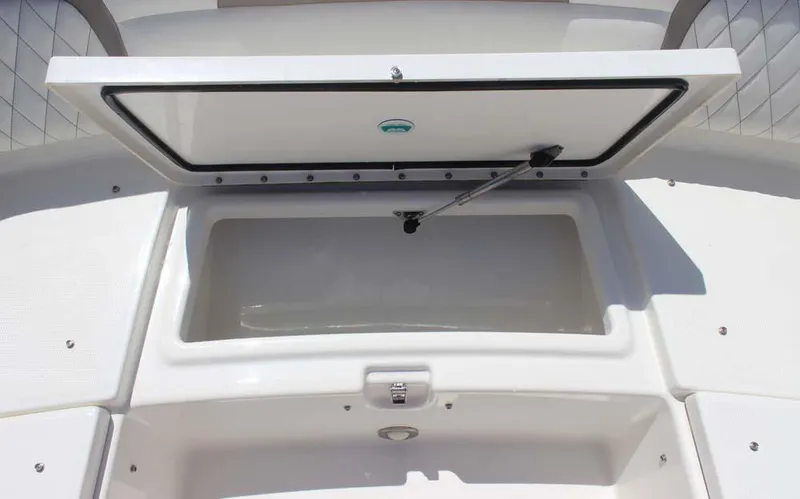 Slide: The Image of 2023 World Cat 280 CC-X storage compartment with open lid, showcasing spacious interior. - 11