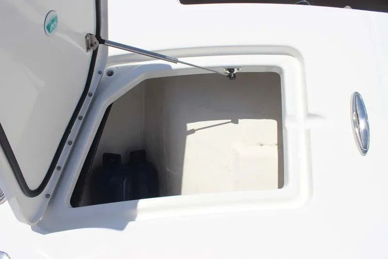 Slide: The Image of Open storage compartment on 2023 World Cat 280 CC-X boat. - 5