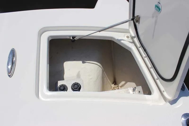 Slide: The Image of Open storage compartment on 2023 World Cat 280 CC-X boat. - 6