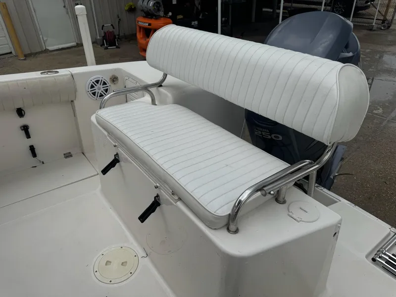 Slide: The Image of White seating on 2004 Robalo R230 Center Console boat, featuring Yamaha 250 engine. - 13
