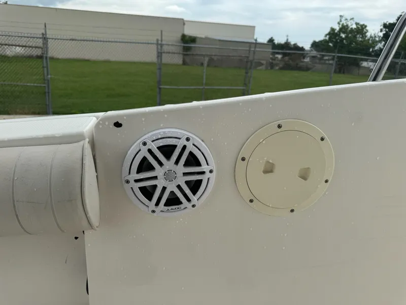 Slide: The Image of 2004 Robalo R230 Center Console boat speaker and panel detail. - 28
