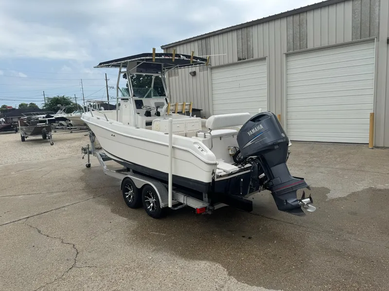 Slide: The Image of 2004 Robalo R230 Center Console boat with Yamaha outboard motor on trailer. - 4