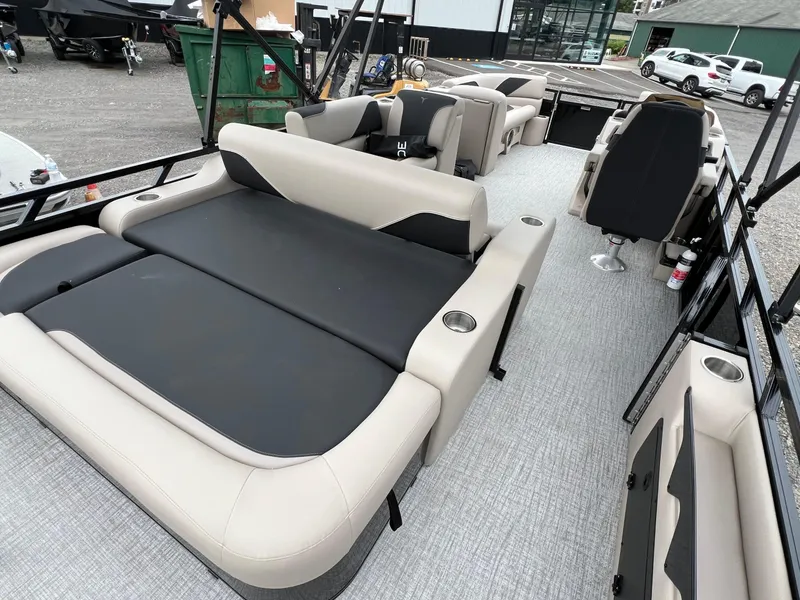 Slide: The Image of 2026 Tahoe Pontoon 2385 VRB interior with luxurious seating and modern design. - 12
