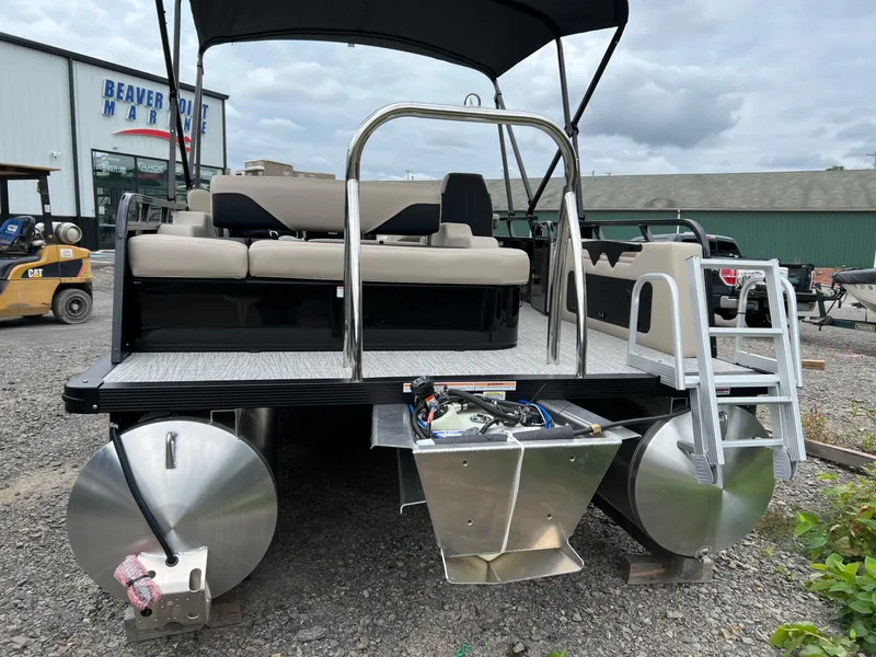 Slide: The Image of 2026 Tahoe Pontoon 2385 VRB at Beaver Point Marine, featuring rear seating and ladder. - 6