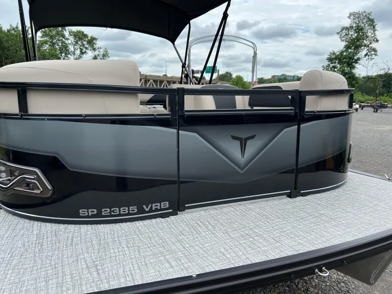 Slide: The Image of 2026 Tahoe Pontoon 2385 VRB boat with sleek design and comfortable seating. - 7