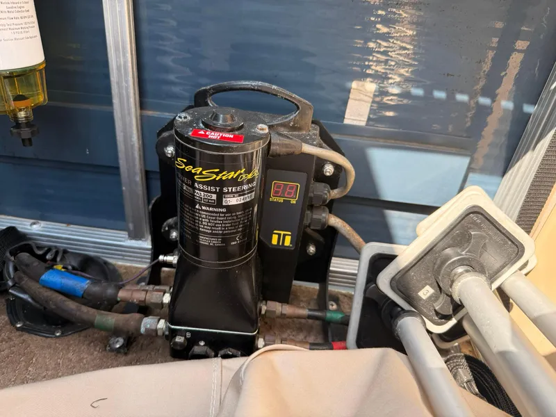 Slide: The Image of SeaStar power assist steering system on a 2009 Bennington 2275QXi boat. - 18
