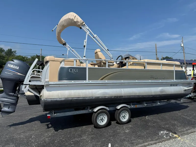 Slide: The Image of 2009 Bennington 2275QXi pontoon boat on trailer with Yamaha outboard motor. - 5