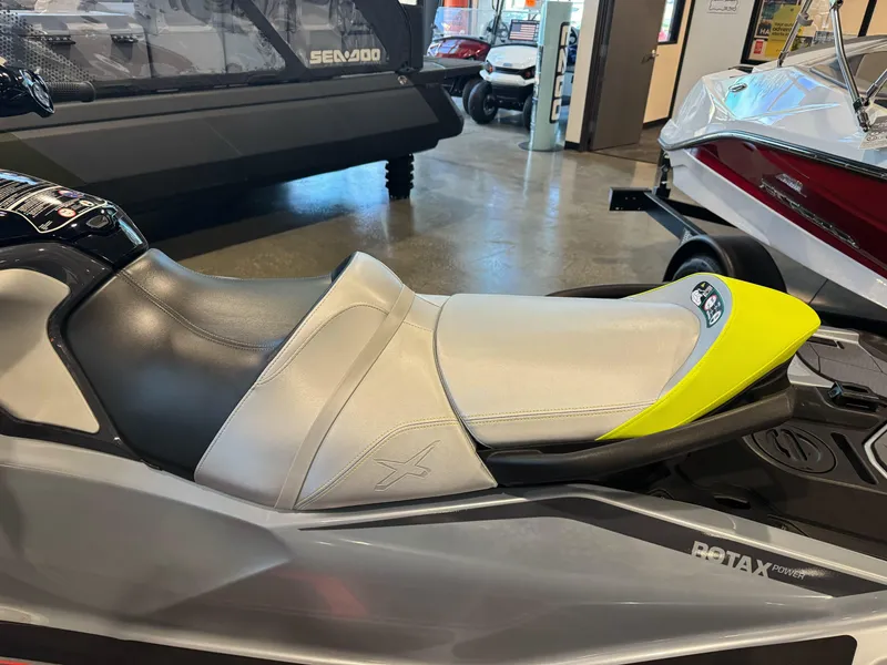 Slide: The Image of 2025 Sea-Doo RXT-X 325 jet ski with sleek design and comfortable seating. - 6