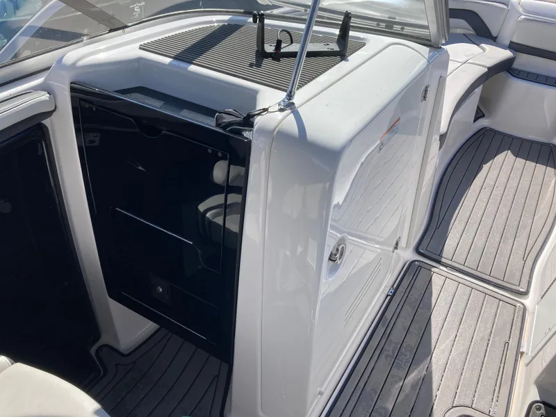 Slide: The Image of 2017 Yamaha Boats 242 Limited S E-Series interior with sleek design and seating. - 23