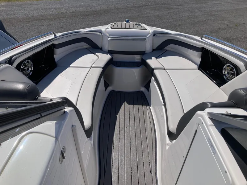 Slide: The Image of 2017 Yamaha Boats 242 Limited S E-Series interior with spacious seating and sleek design. - 30