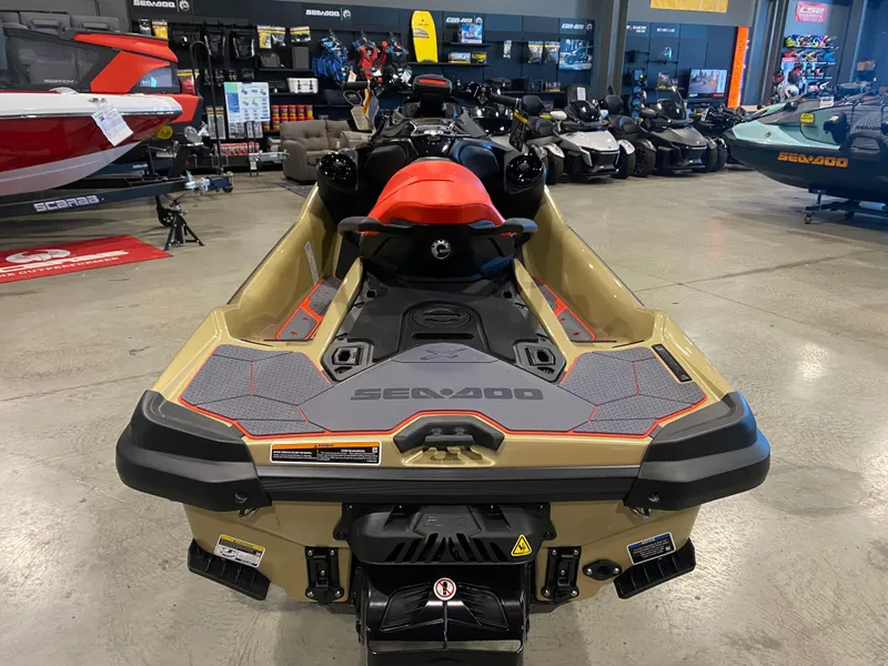 Slide: The Image of 2025 Sea-Doo RXT-X 325 jet ski in showroom, rear view. - 7