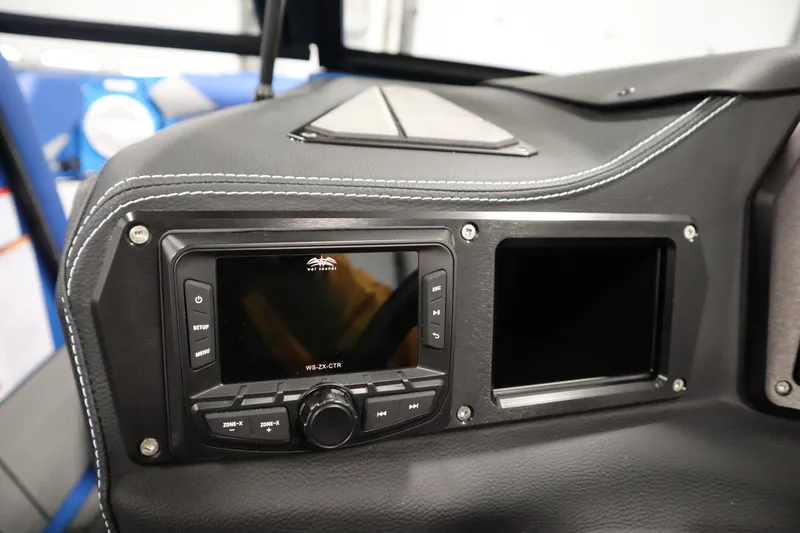 Slide: The Image of Dashboard of a 2025 Centurion Fe23 boat with control panel and display screen. - 20