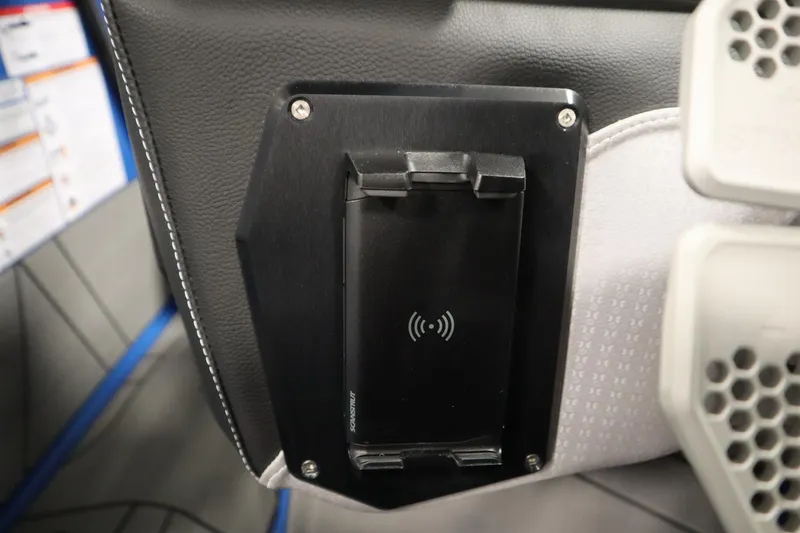 Slide: The Image of Wireless charging pad in 2025 Centurion Fe23 boat interior. - 21