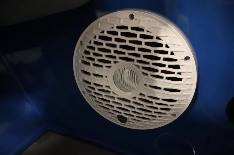 Slide: The Image of White speaker grille on blue Centurion Fe23, 2025 model. - 24