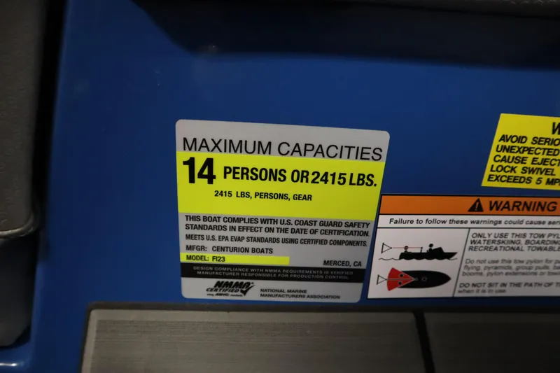 Slide: The Image of Maximum capacity label on 2025 Centurion Fe23 boat, 14 persons or 2415 lbs. - 31