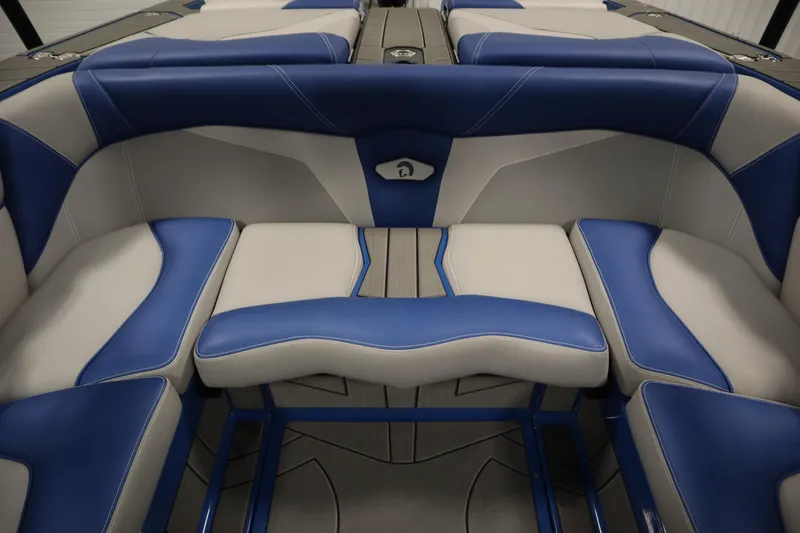 Slide: The Image of 2025 Centurion Fe23 boat interior with blue and gray seating. - 41