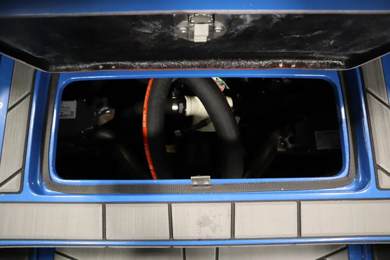 Slide: The Image of Open engine compartment of 2025 Centurion Fe23 boat, showcasing interior components. - 46