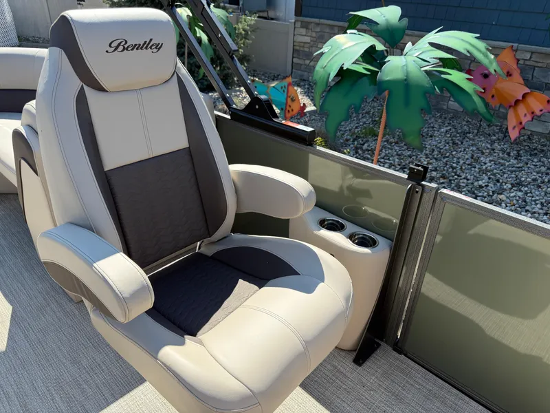 Slide: The Image of Luxurious seating on 2026 Bentley Pontoons Elite 220 Admiral with cup holders and decorative elements. - 14