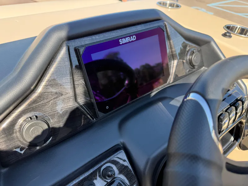 Slide: The Image of Dashboard of 2026 Bentley Pontoons Elite 220 Admiral with Simrad display. - 25