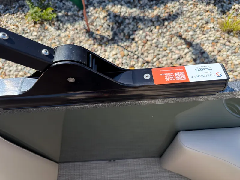 Slide: The Image of Bentley Pontoons Elite 220 Admiral 2026 with SureShade power bimini detail. - 26