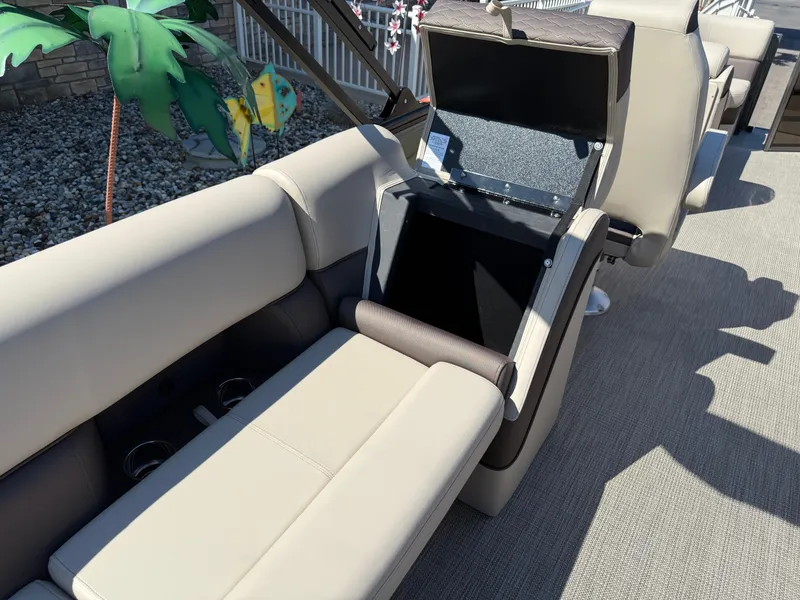 Slide: The Image of 2026 Bentley Pontoons Elite 220 Admiral interior with open storage compartment. - 30