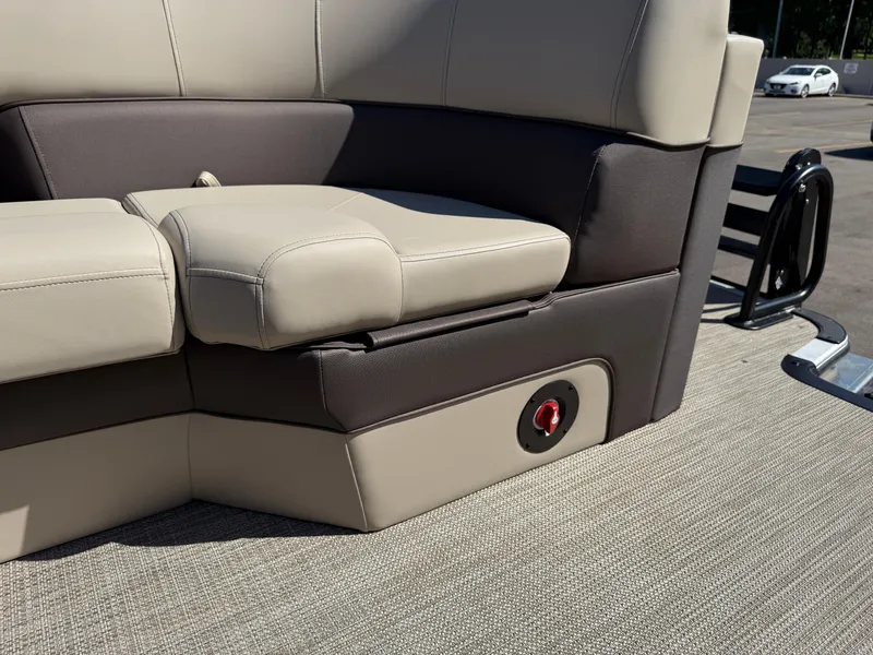Slide: The Image of 2026 Bentley Pontoons Elite 220 Admiral interior seating detail, featuring beige and brown upholstery. - 31