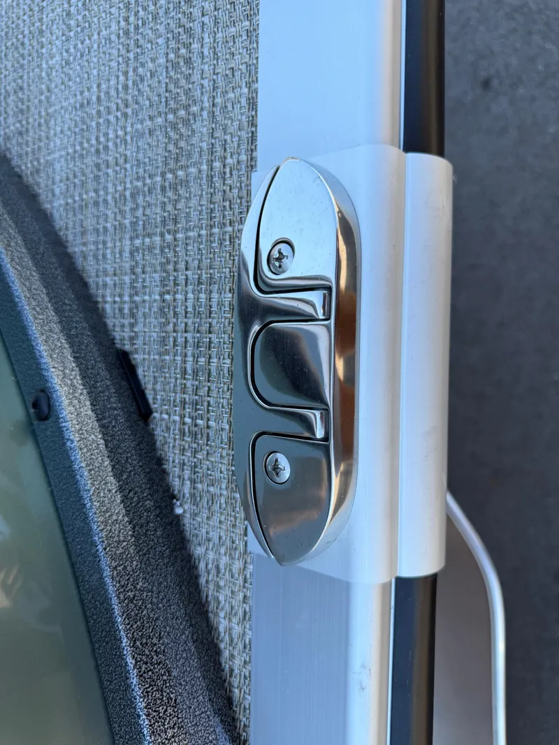 Slide: The Image of Close-up of a latch on a 2026 Bentley Pontoons Elite 220 Admiral. - 5