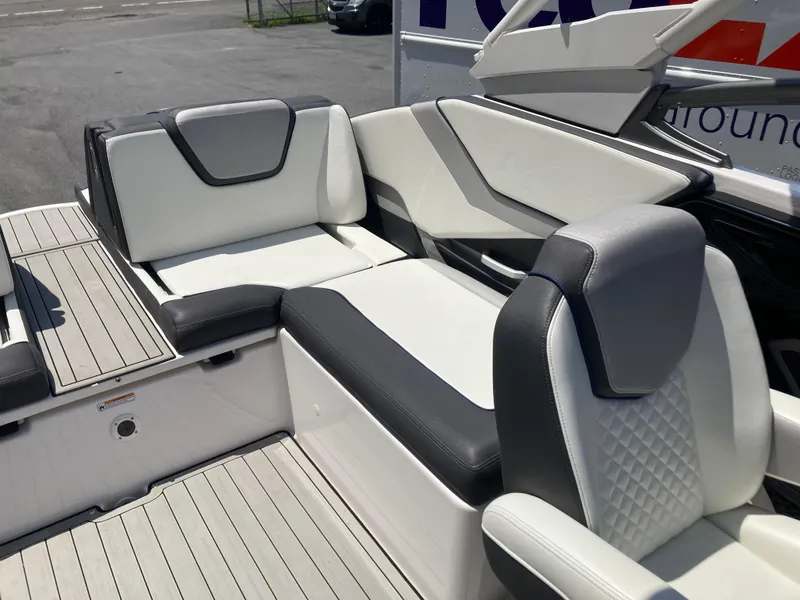 Slide: The Image of 2021 Yamaha Boats 252S interior with sleek, modern seating and stylish design. - 21