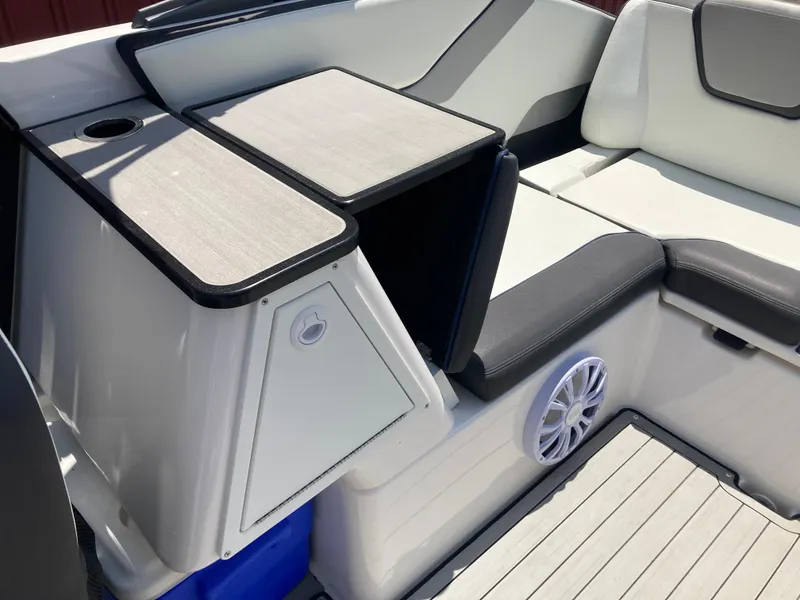 Slide: The Image of 2021 Yamaha Boats 252S interior with seating and speaker detail. - 23