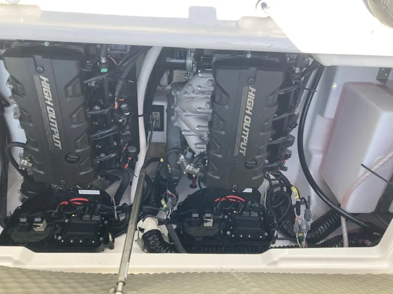 Slide: The Image of 2021 Yamaha Boats 252S engine compartment with dual high output engines. - 24