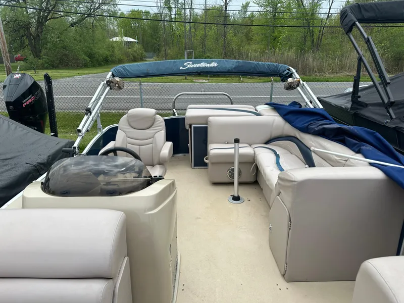 Slide: The Image of 2014 Sweetwater Premium Edition 200 pontoon boat with spacious seating and canopy. - 5