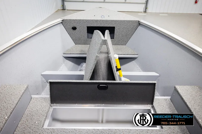 Slide: The Image of 2026 Lund 1600 Fury Tiller boat interior with storage compartments, displayed at Reeder-Trausch Marine. - 20