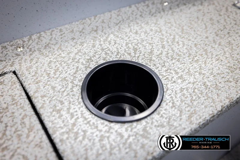 Slide: The Image of Cup holder on Lund 1600 Fury Tiller boat, 2026 model, textured surface, Reeder-Trausch Marine logo. - 28