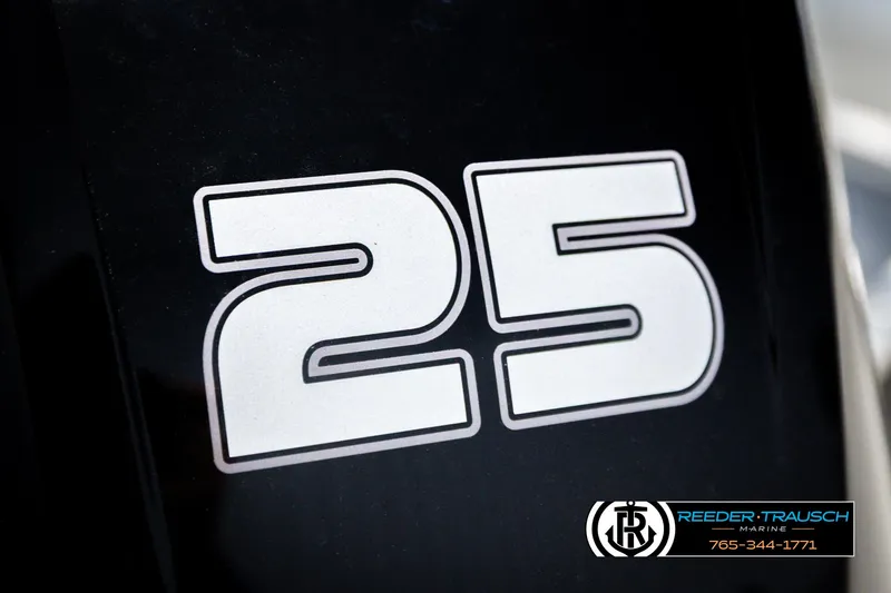 Slide: The Image of Close-up of '25' decal on 2026 Lund 1600 Fury Tiller boat. - 33