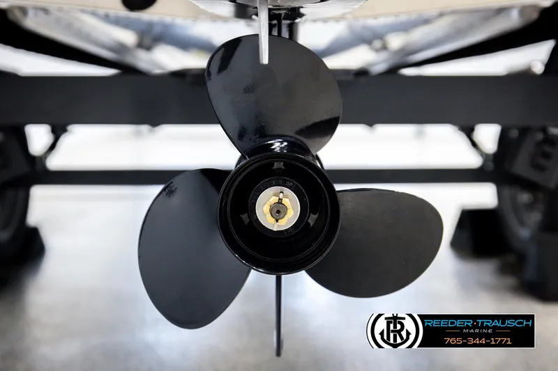 Slide: The Image of Close-up of a 2026 Lund 1600 Fury Tiller boat propeller. - 34