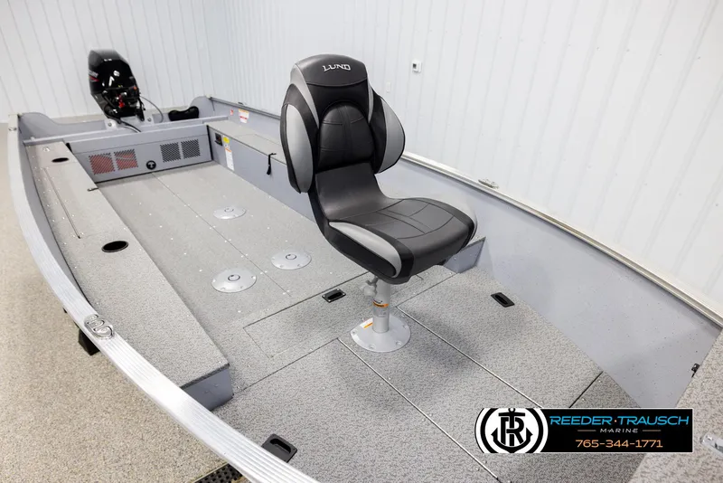 Slide: The Image of 2026 Lund 1600 Fury Tiller boat interior with swivel seat and motor, Reeder-Trausch Marine. - 7