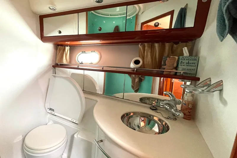 Slide: The Image of Luxurious bathroom in 2007 Prestige 46 Flybridge yacht with modern fixtures and elegant design. - 15