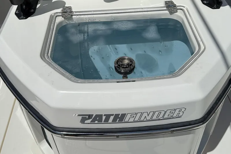 Slide: The Image of 2024 Pathfinder 2700 Open boat livewell with clear lid and water inside. - 12
