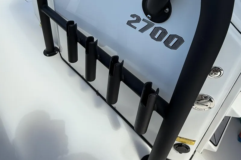 Slide: The Image of 2024 Pathfinder 2700 Open boat with rod holders and sleek design. - 15