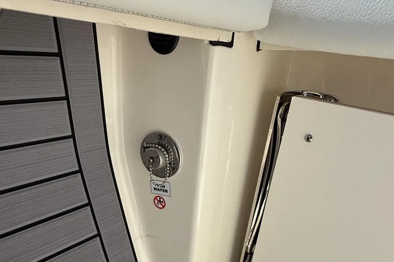 Slide: The Image of 2024 Pathfinder 2700 Open boat detail showing water access and deck design. - 22