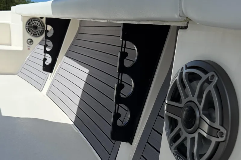 Slide: The Image of 2024 Pathfinder 2700 Open boat interior with speakers and rod holders. - 24