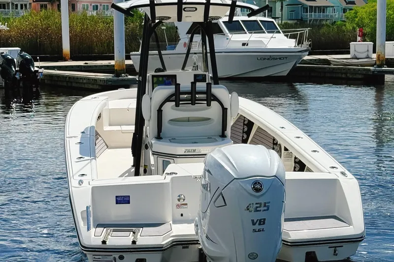 Slide: The Image of 2024 Pathfinder 2700 Open boat docked, featuring a powerful Yamaha 425 V8 engine. - 3