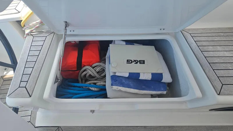 Slide: The Image of Storage compartment on a 2016 Hanse 415 yacht with ropes and equipment. - 12