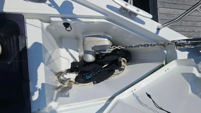 Slide: The Image of Anchor chain and ropes on a 2016 Hanse 415 sailboat deck. - 28