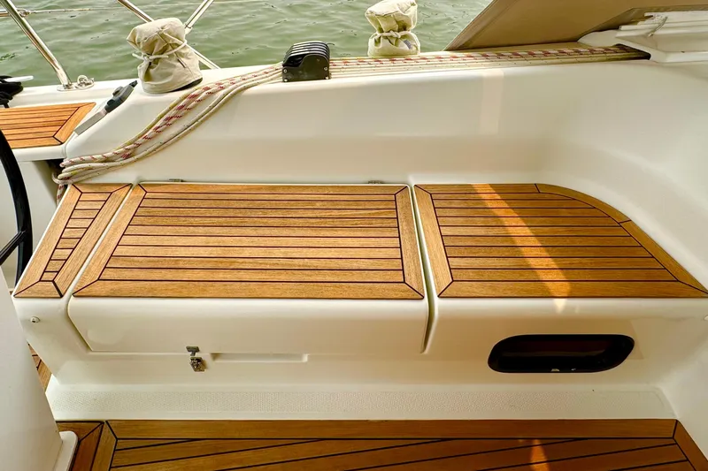 Slide: The Image of Teak deck seating on 2016 Hanse 415 yacht, featuring elegant wood finish. - 10