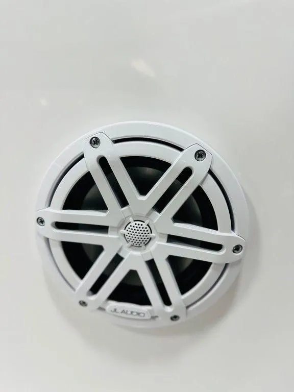 Slide: The Image of White JL Audio speaker on Sportsman Heritage 231, 2025 model. - 7